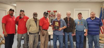 Image from left to right: Asst. Chief James Leonard, Fireman Sandy Evans, Board Member Ricky Cash, Chairman Charles Hopkins, Chi